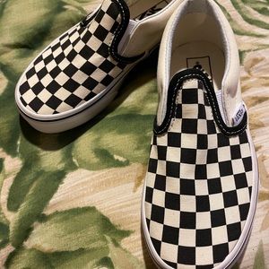 Vans, super comfy slip on. Checkers version